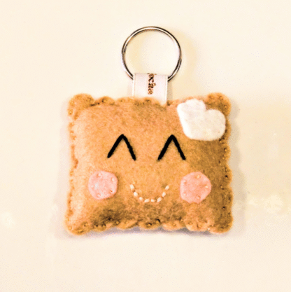 Porte-clés petit biscuit en feutrine de laine par l'Atelier Jocha